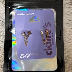 Claire’s cross earrings